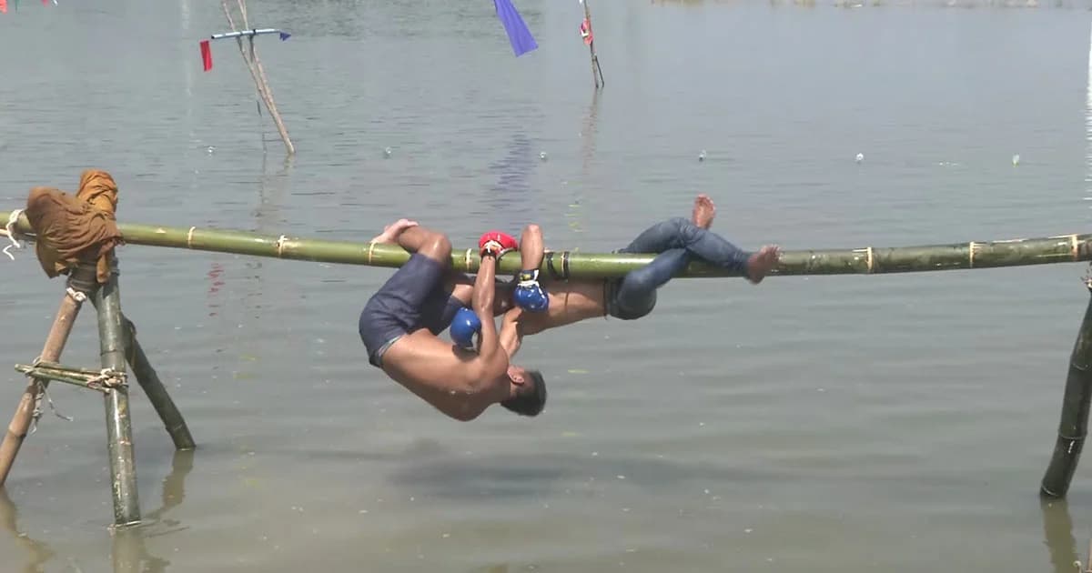 เฮฮา ! สีสันกีฬาพื้นบ้านกลางทุ่งนาน้ำท่วม