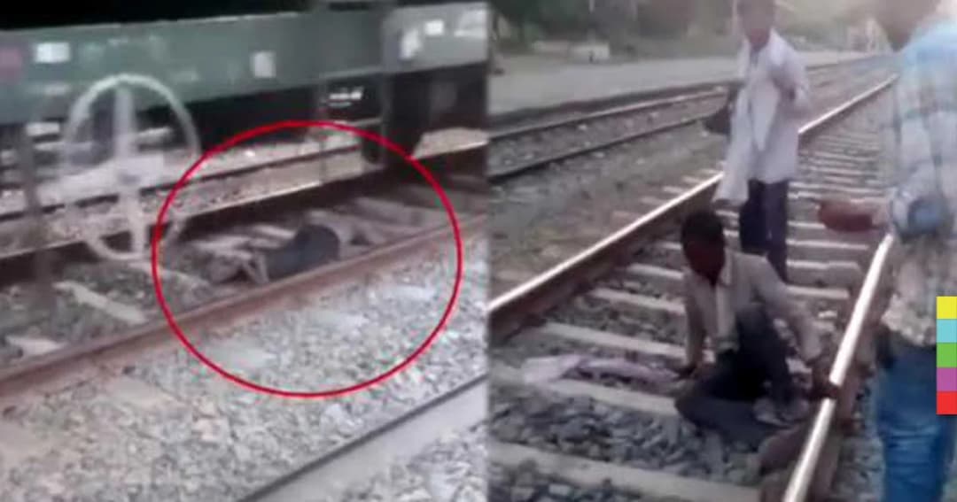 หวาดเสียว ! รถไฟวิ่งผ่านเหนือร่างชายชาวอินเดียไปอย่างเฉียดฉิว