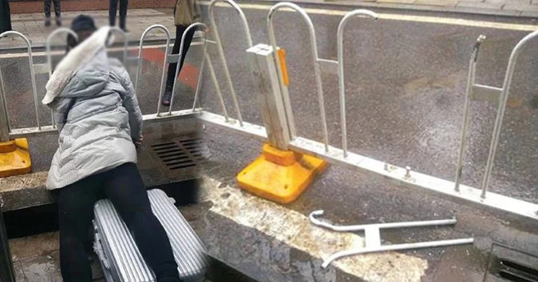 ‘สาวจีน’ สะดุดกระเป๋าล้ม คอติดรั้วข้างทางดับ