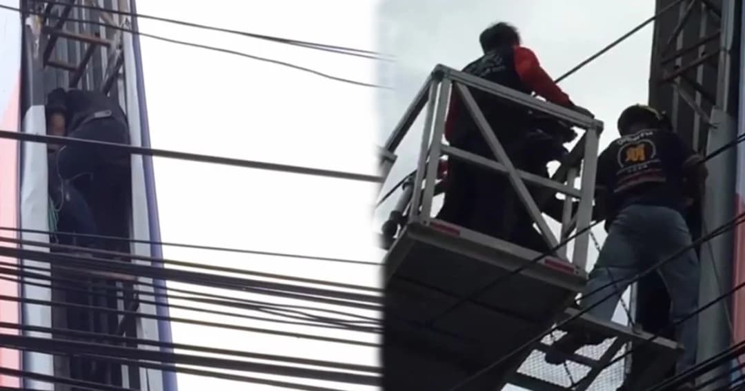 หนุ่มช่างติดตั้งป้าย ถูกไฟฟ้าแรงสูงช็อตติดคาป้าย