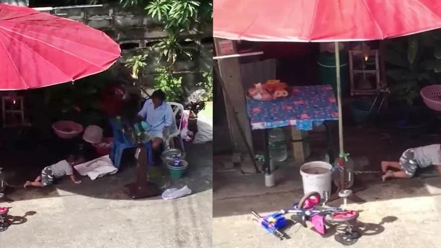 โซเชียลจวกยับ ! คลิปแม่ผูกขาลูกไว้กับเสาร่ม ขณะนั่งขายของริมถนน