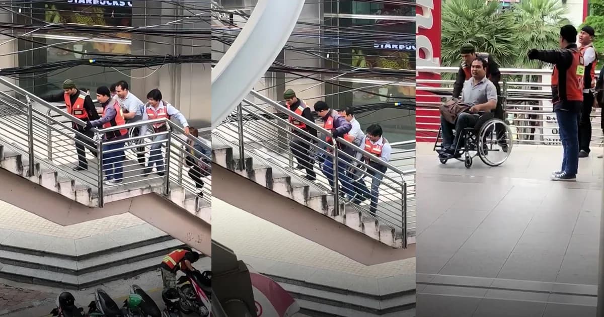 น้ำใจงาม ! วิน จยย. ช่วยยกรถเข็นผู้พิการข้ามสะพานลอย