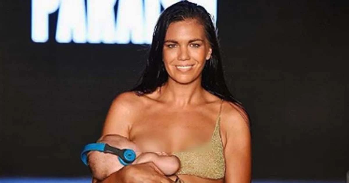 มือไกวดาบแกว่ง “คุณแม่นางแบบ” เดินให้นมลูกบนแคทวอล์ก