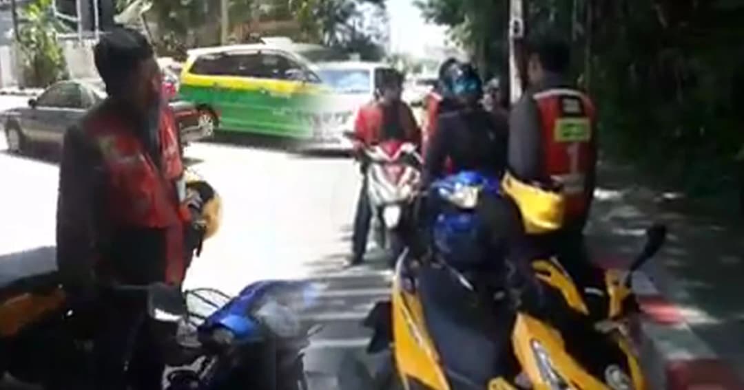 กลุ่มวิน จยย. ยืนล้อมแกร็บไบค์ ท้าต่อยตัวต่อตัว ไม่พอใจส่งคนในพื้นที่