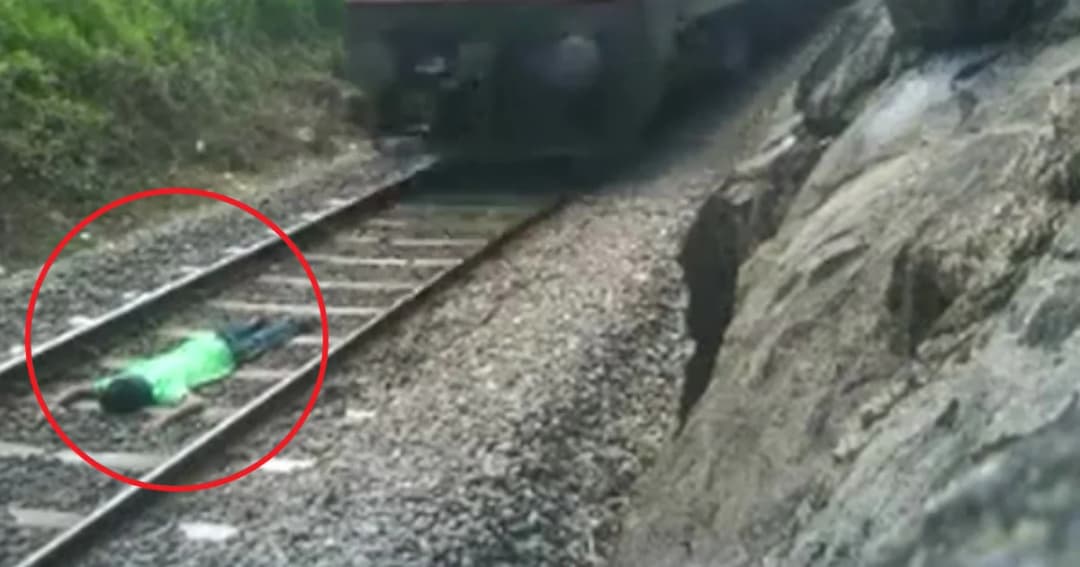 หนุ่มอินเดียโชว์เสียว! ถ่ายคลิปนอนกลางรางให้รถไฟวิ่งผ่าน