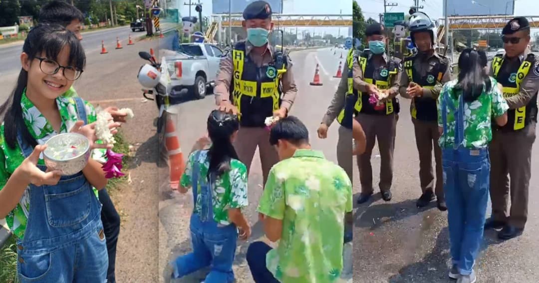 สุดน่ารัก! ลูกๆ ตำรวจทางหลวง รดน้ำขอพรพ่อ ริม ถ.มิตรภาพ ให้กำลังใจทำงานดูแลการจราจร