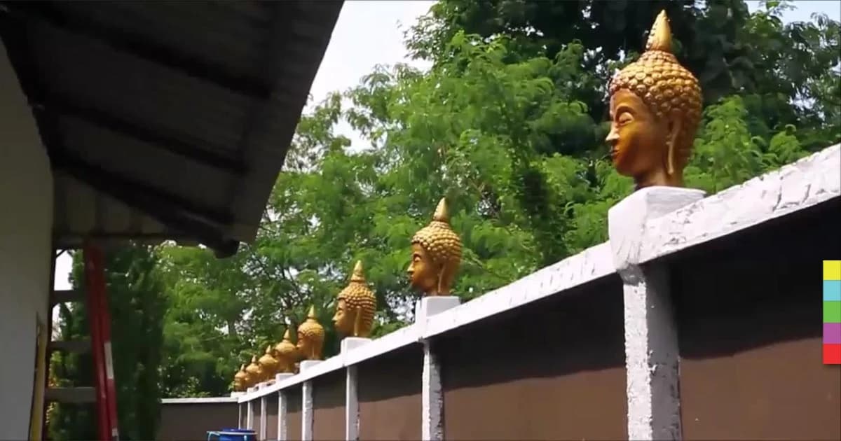 สะเทือนใจชาวพุทธ ! ต่างชาติใช้เศียรพระพุทธรูปแต่งรั้วบ้าน