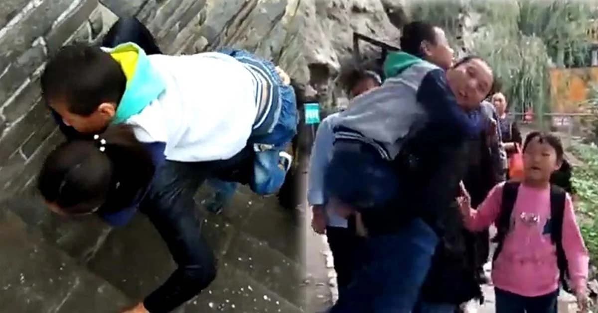 แม่แบกลูกป่วยขึ้นหลัง เที่ยวกำแพงเมืองจีน