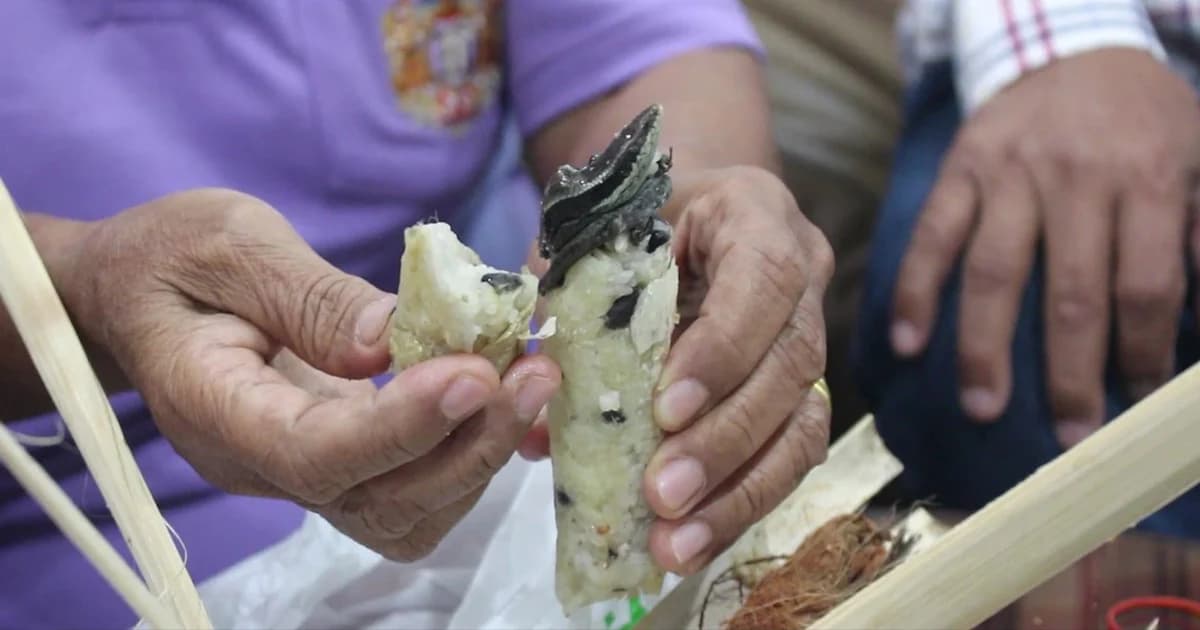 ช็อก ! เจอจิ้งเหลนในกระบอกข้าวหลาม ซื้อจากสถานีรถไฟ